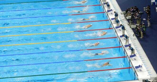 Vilken amerikansk simmare vann åtta guld vid OS i Peking?